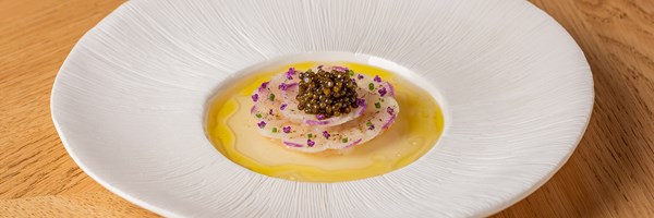 Hélène Darroze at The Connaught - focus on a dish with caviar on top